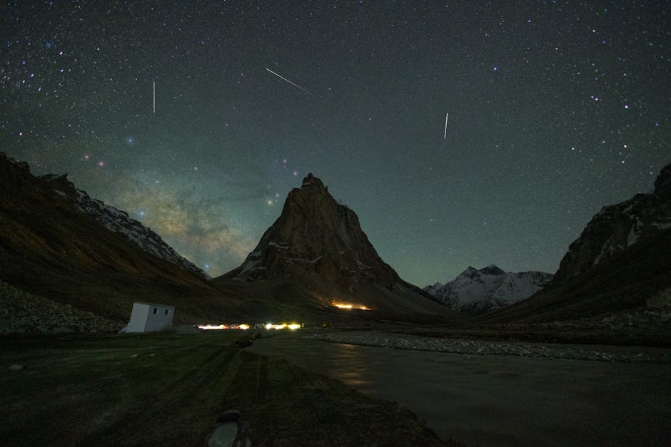 A cat flying through a starry night sky, with the milky way galaxy as the backdrop. The style is fantasy, with bright colors and a dreamy atmosphere.